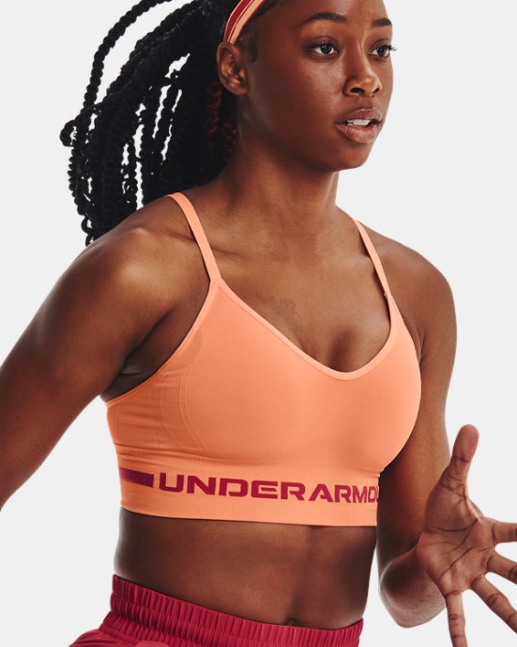 Women's UA Seamless Low Long Sports Bra in Orange image number 1